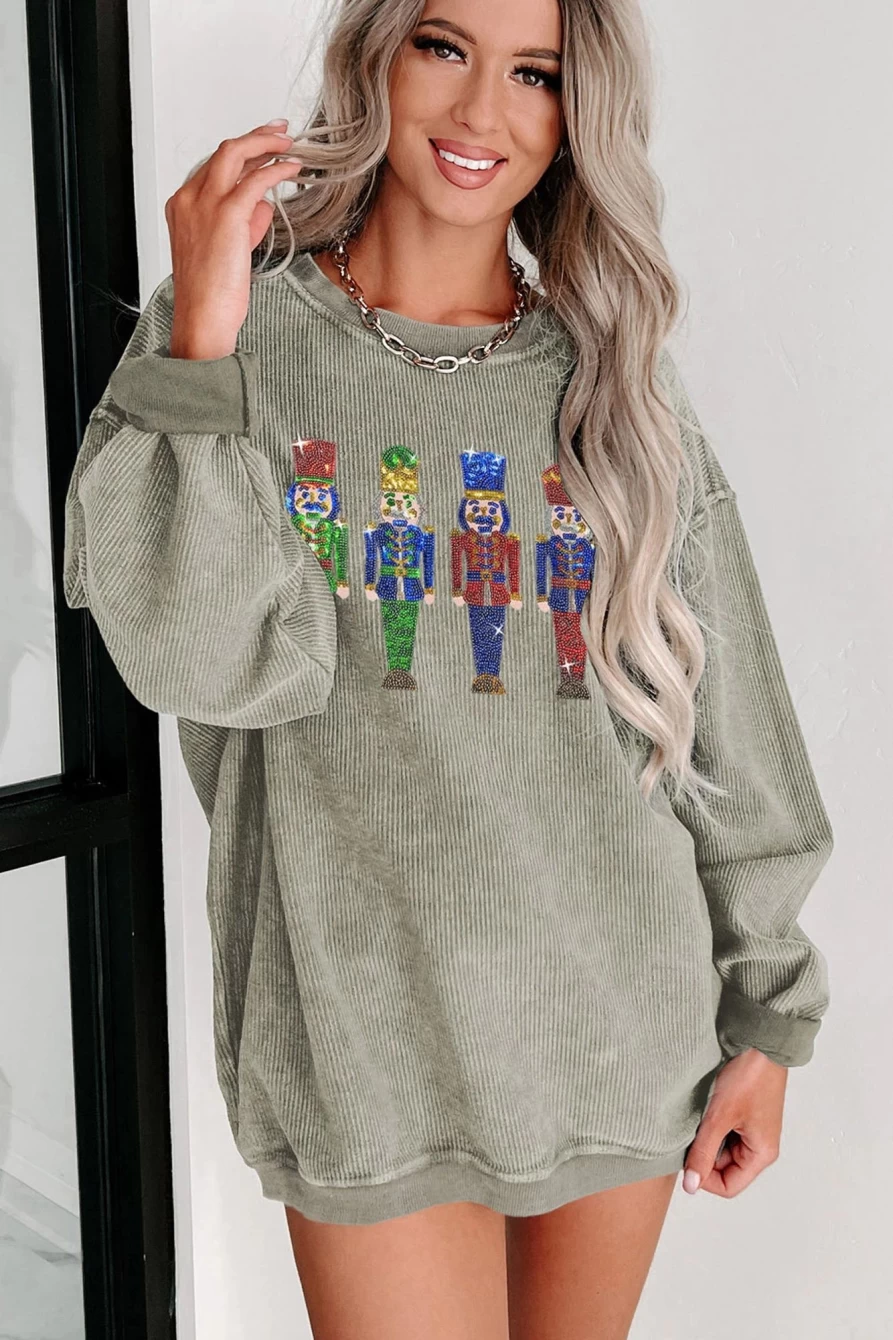Shewin Women's Green Christmas Nutcracker Sweatshirt with Corded Sequins Detail