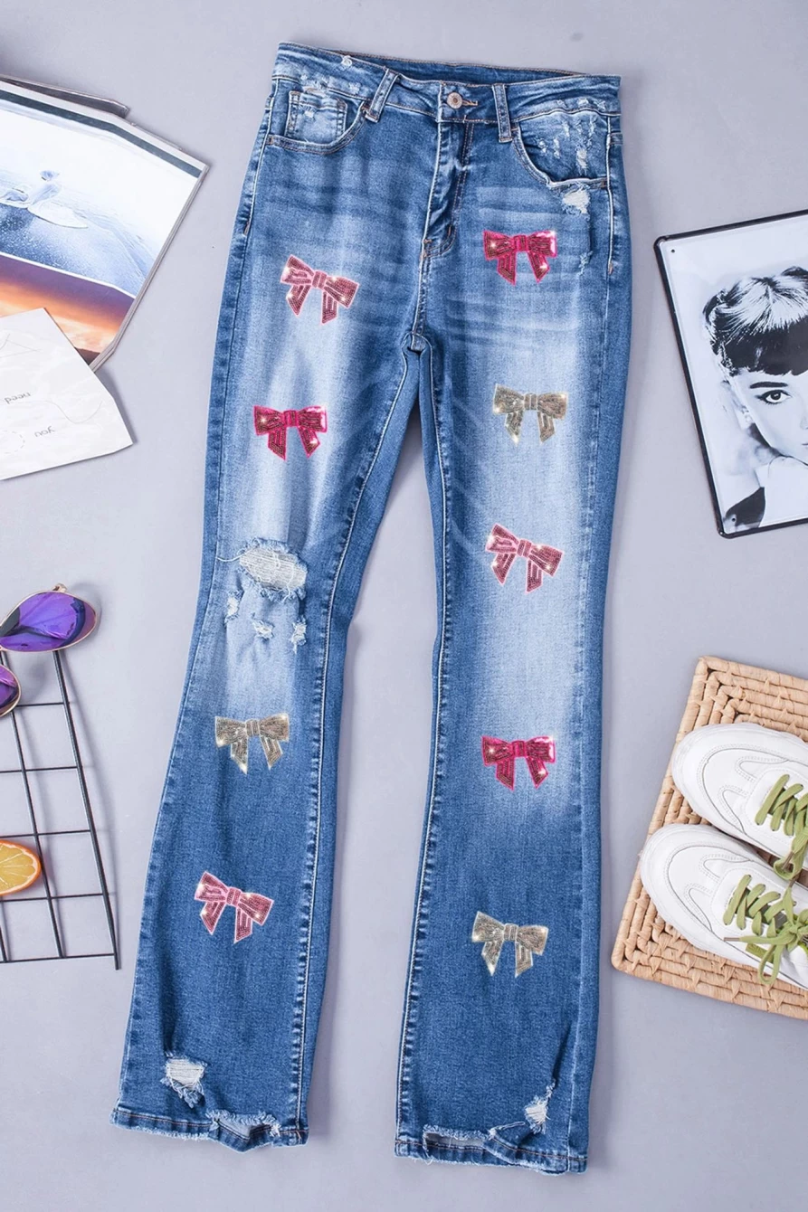 Shewin Women's Blue Sequin Mardi Gras Flared Jeans with Bowknot & Distressed Details