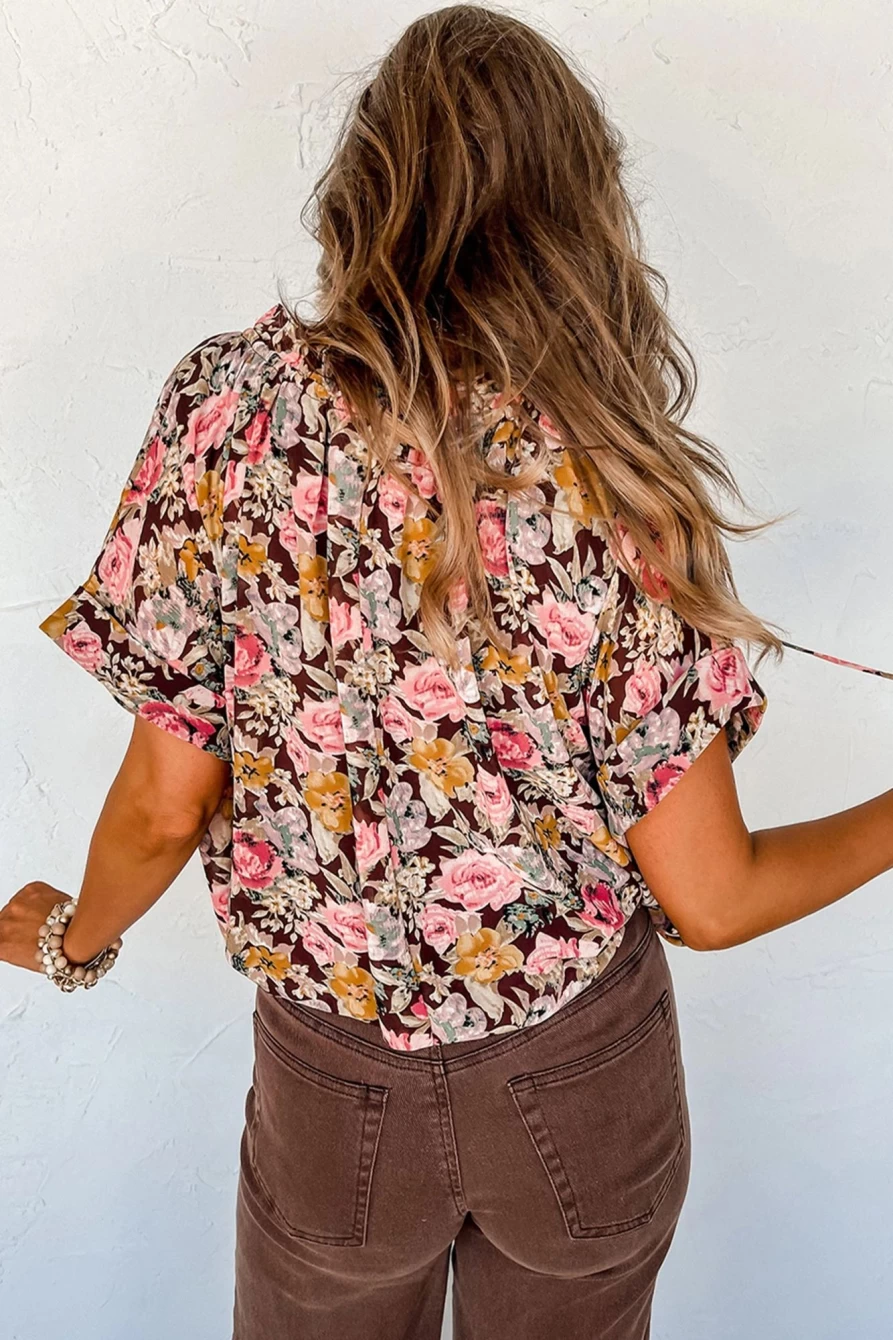 Shewin Women's Pink Floral Print Blouse with Bubble Hem & Split Neck Design