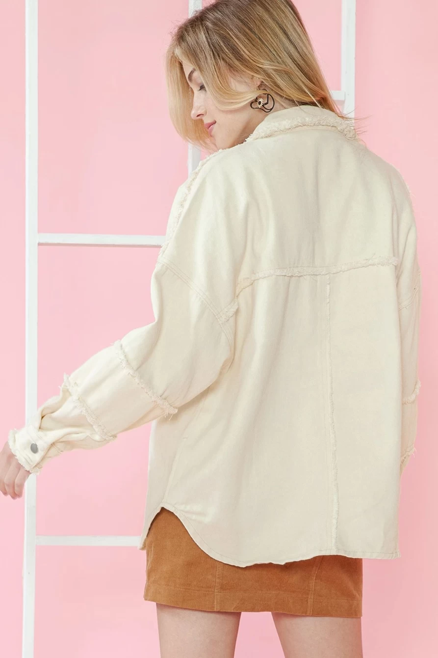Shewin Women's White Distressed Denim Jacket with Exposed Seams - Frayed Edge Design