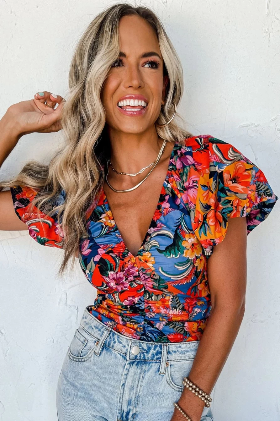 Shewin Women's Orange Floral Print Blouse with Ruched Detail & Puff Sleeves V-Neck Top