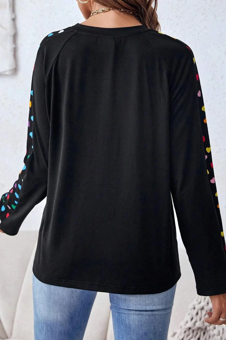 Shewin Women's Black Heart Print Raglan Sleeve Top with Patched Pocket