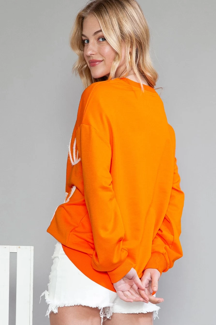 Shewin Women's Carrot Orange Contrast Trim Long Sleeve Game Day Top