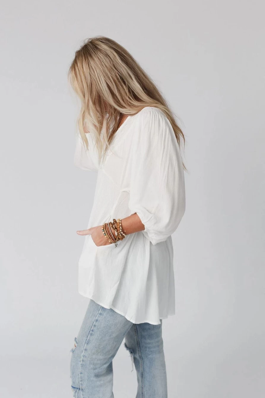 Shewin Women's White Lace V-Neck Blouse with Ruffle Sleeves and Bracelet Detailing